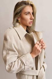 Cappotto spigato panna con paillettes