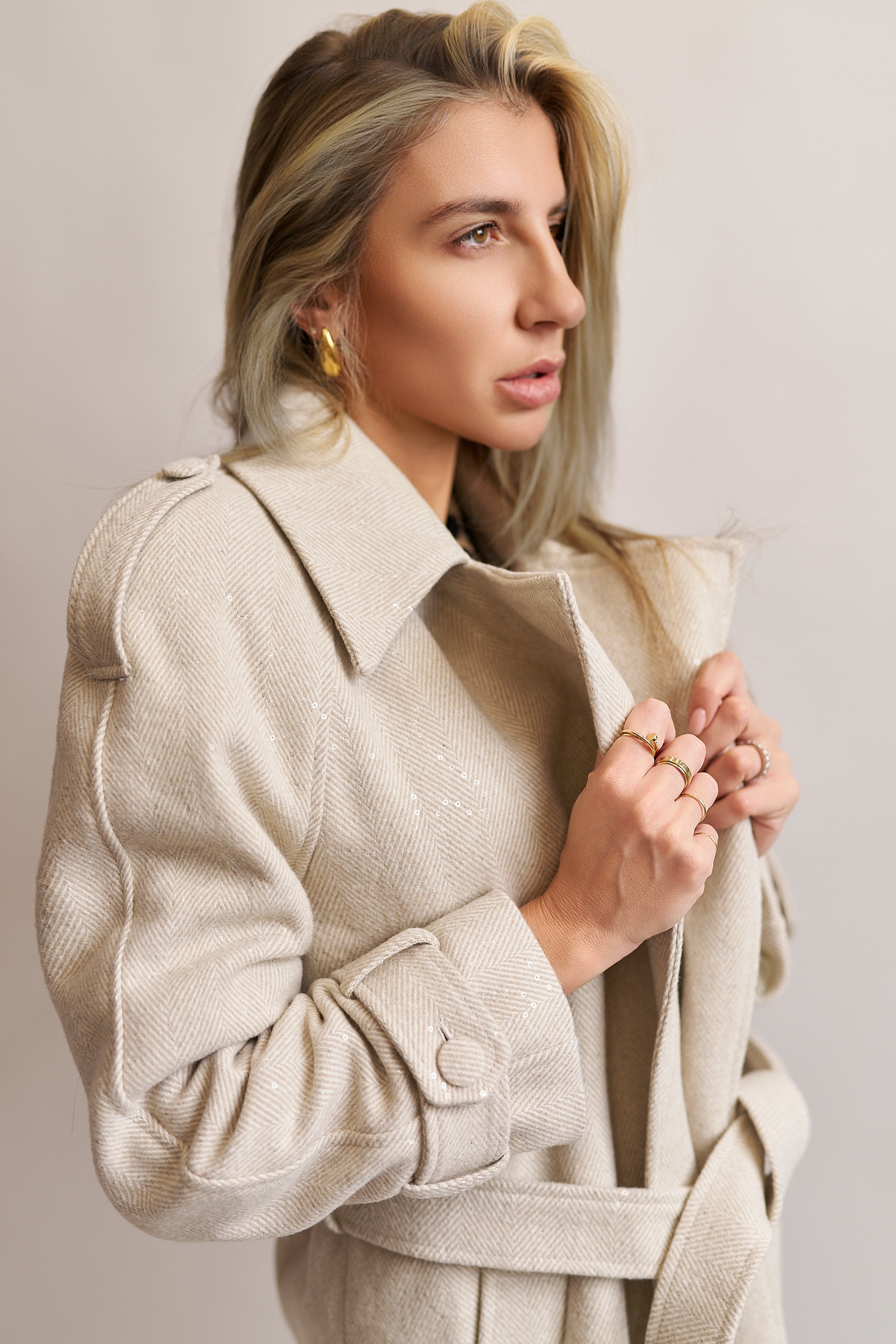 Cappotto spigato panna con paillettes
